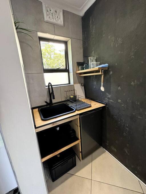 Penguins Cove Coastal Sanctuary Studio Apartment-Bloubergstrand Cidade Do Cabo Exterior foto