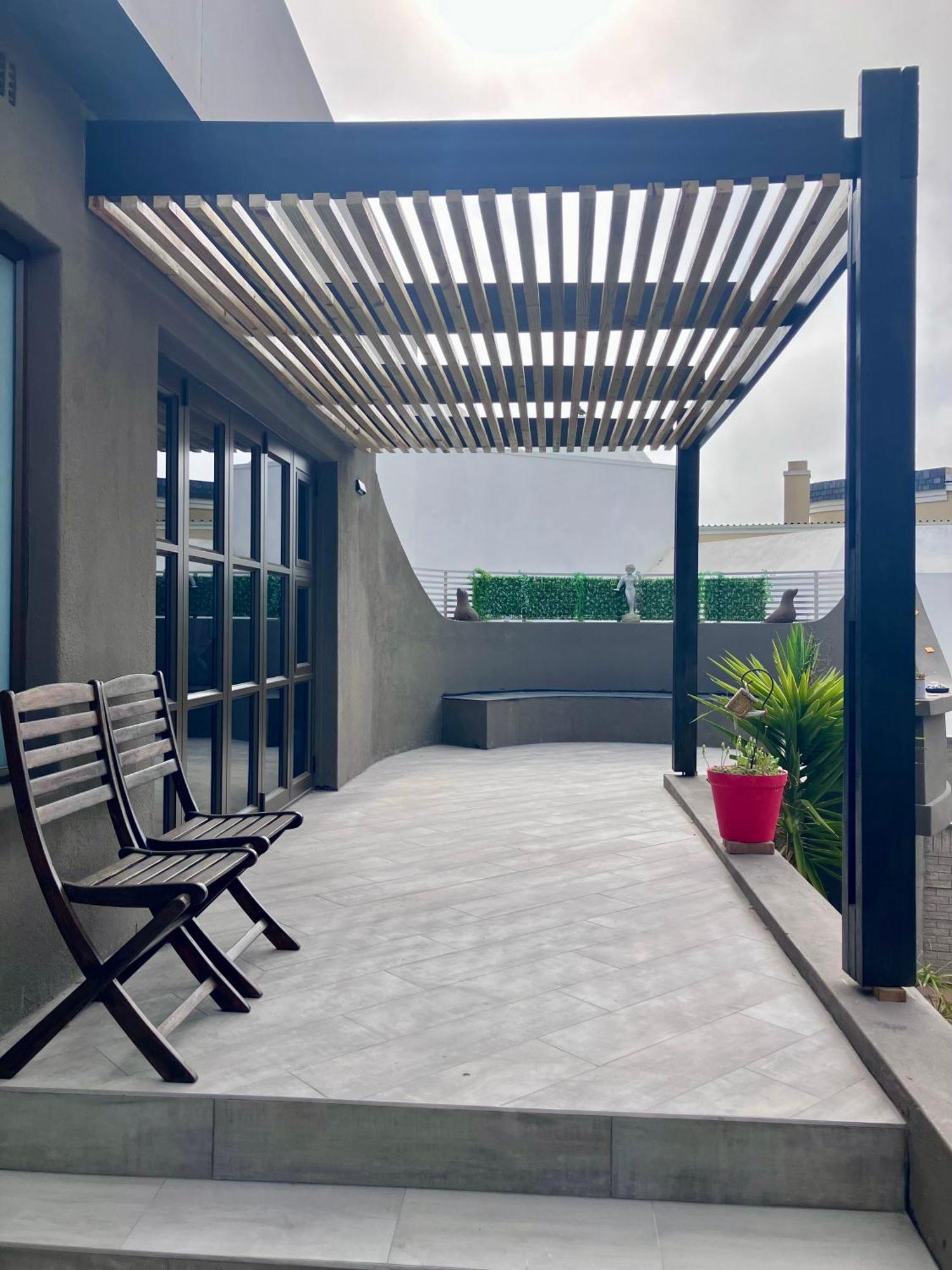 Penguins Cove Coastal Sanctuary Studio Apartment-Bloubergstrand Cidade Do Cabo Exterior foto
