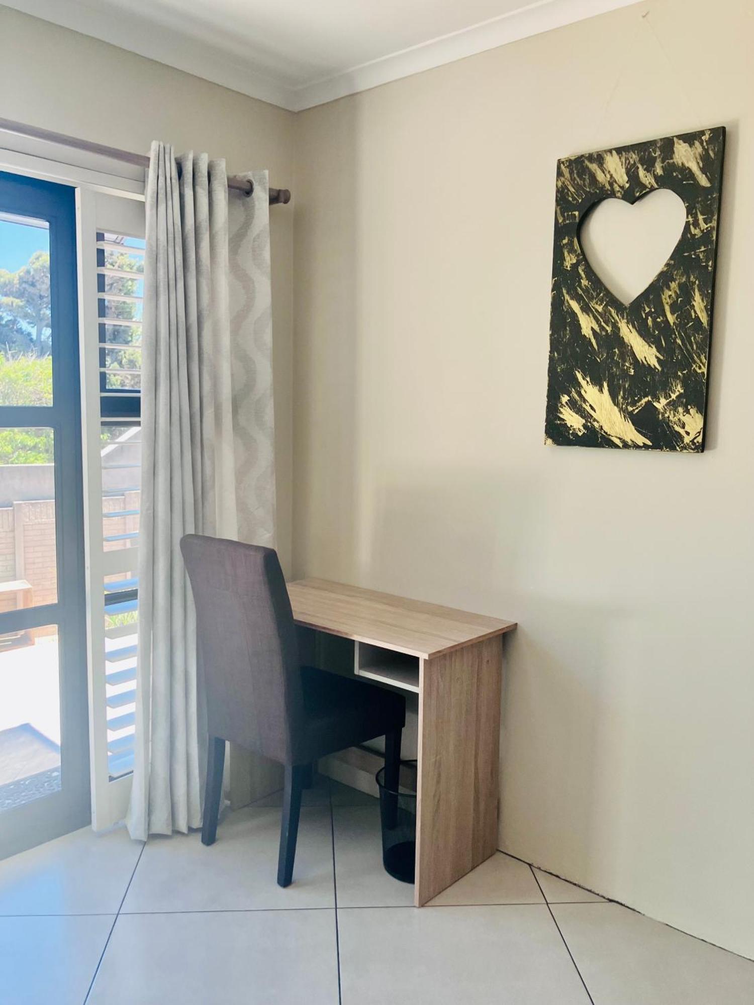 Penguins Cove Coastal Sanctuary Studio Apartment-Bloubergstrand Cidade Do Cabo Exterior foto